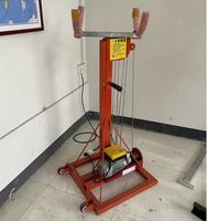Levage vertical pour les portes de volet roulant Machine de levage mobile
