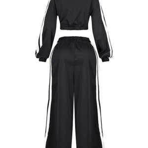 Conjunto Deportivo de Mujer, Estilo 2025, Chaqueta Corta con Cierre y Pantalones Anchos a Rayas Blancas y Negras - Product Image 5