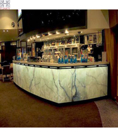 Comptoir de bar éclairé par LED en pierre artificielle à l'aspect moderne translucide avec une finition brillante écologique à usage commercial