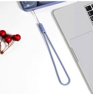 Promoción al por mayor: Soporte de silicona suave para teléfono móvil con cordón corto de goma - Product Image 5