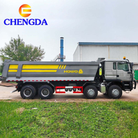 Camion benne SINOTRUK HOWO TX 8x4 12 roues LHD Euro 2 Diesel 30 tonnes d'occasion en bon état à vendre