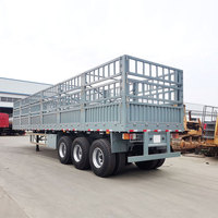 Camion semi-remorque en acier à 3 essieux de 60 tonnes pour le transport d'animaux de cargaison de bétail de canne à sucre en Afrique avec clôture à piquet