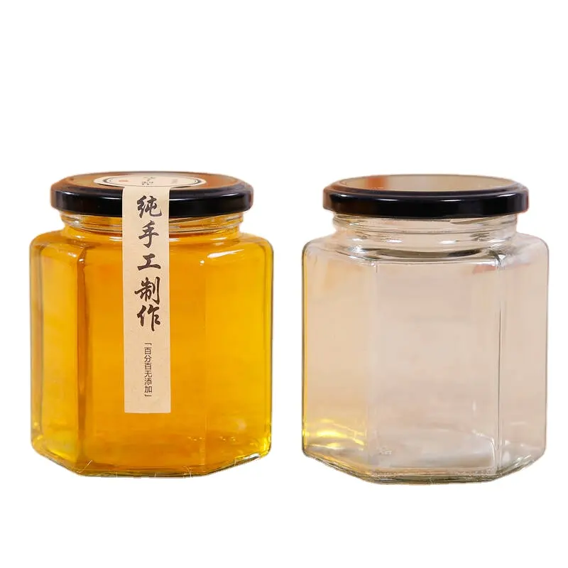 Commercio all'ingrosso a buon mercato di esagono di conservazione degli alimenti vuoto honey bee vaso di vetro per l'inscatolamento con coperchio in metallo
