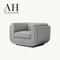 Fauteuil d'appoint élégant et arrondi gris, canapé minimaliste en tissu rembourré en forme de U, fauteuil de club haut de gamme pour hôtel