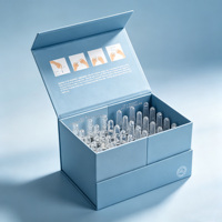 Boîte cadeau rigide pliable de qualité supérieure, couleur nude, pour emballage de sérum et d'ampoules de soin de la peau, avec logo imprimé personnalisé et insert.