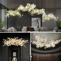 Lustre moderne en céramique en forme de feuille de Ginkgo, long et personnalisé, pour la décoration de hall d'hôtel, de villa ou d'escalier