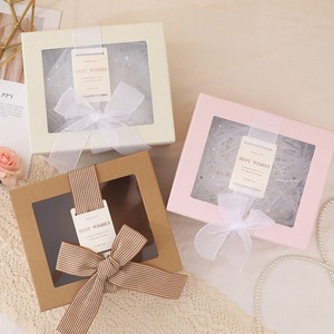 Elegante Caja de Regalo Redonda con Ventana Circular Transparente, Laminación Brillante y Asa de Papel Especial - Product Image 1