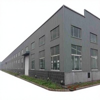 Bâtiment industriel préfabriqué en structure acier avec système de grue monorail Q235 Q355, construction rapide directe d'usine