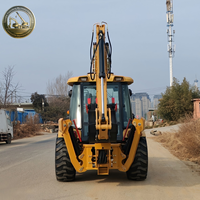 Offre Spéciale : Chargeuse-pelleteuse CAT 430F 420F d'occasion, 90% neuve, 4x4, excellent état pour travaux agricoles, construction et creusement de fossés