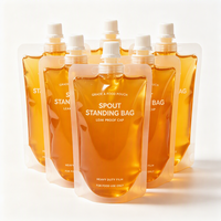 Pochettes souples transparentes personnalisées de différentes tailles avec bec verseur, refermables et thermoscellables pour suppléments liquides, miel et huiles
