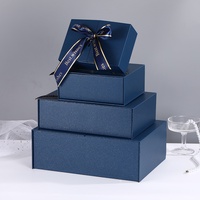 Élégante boîte cadeau en papier spécial bleu avec un nœud scintillant chic, design à double porte, idéale pour la fête des enseignants et les cadeaux d'anniversaire