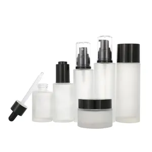 Serie Volume satinato lozione vetro incolore nero pompa bottiglia di lusso cosmetici Packaging Set di cura della pelle vuota