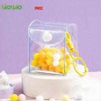 UIOWIO Vente en gros personnalisée de sacs cadeaux en plastique colorés, mini pochette transparente à bouton pression en PVC, housse pour jouets d'enfants en PVC