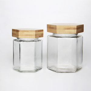 Bán Buôn Lục Giác Lọ Thủy Tinh 300G 500G Trong Suốt Ngâm Rau Bee Lọ Thủy Tinh Với Nắp Bằng Gỗ - Product Image 1