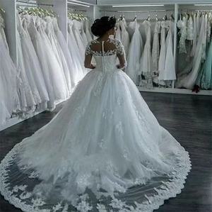 Abito da Sposa Classico Bianco Puro in Pizzo Africano Stile Più Recente 2022 - Product Image 1