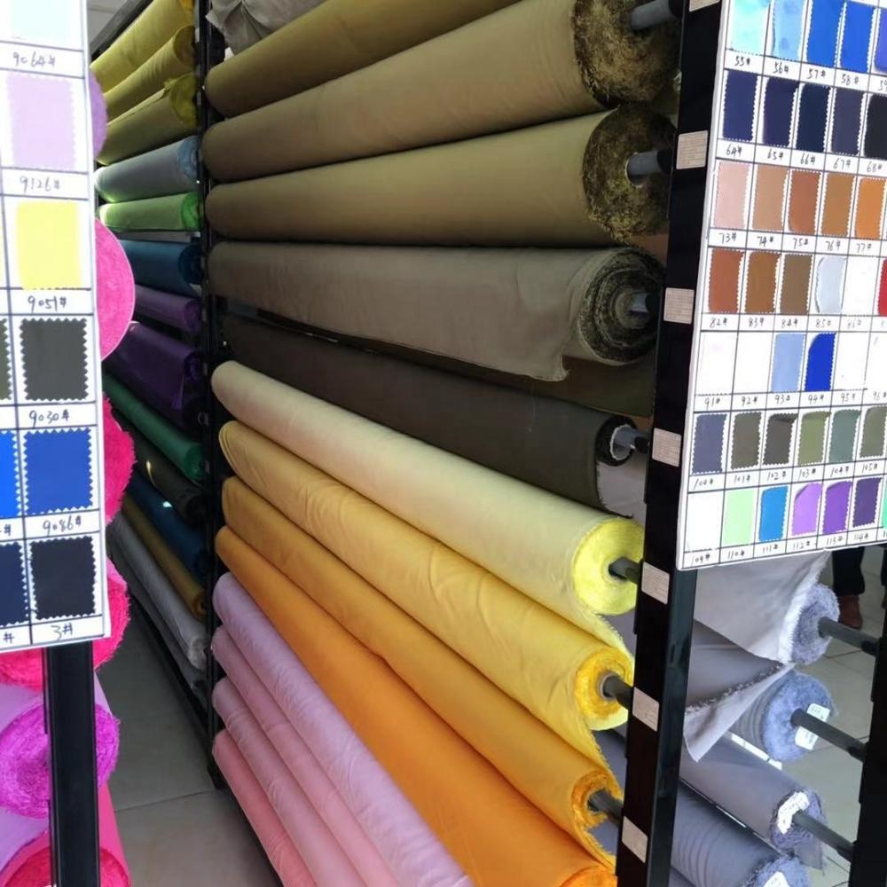 Düşük adedi 50m birçok renk stok 50D kadife yumuşak aşağı ceket su geçirmez % 100% Polyester kumaş