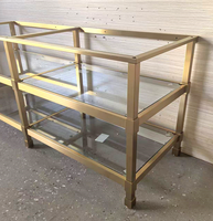 Système de pieds de meuble-lavabo de salle de bain de luxe en or pour hôtel, avec cadre en laiton et plateau en pierre lourde, personnalisable pour décoration de complexe hôtelier 2026