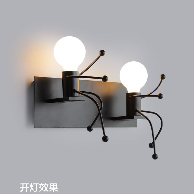 Omino seduto a due teste