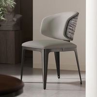 Chaise de salle à manger moderne haut de gamme confortable en acier ondulé pour hôtel, villa, restaurant, usage exclusif au sol plat