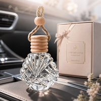 Diffuseur de parfum pour voiture en verre facetté en forme de coquillage, réutilisable, 14 ml, avec bouchon en bois naturel et corde.