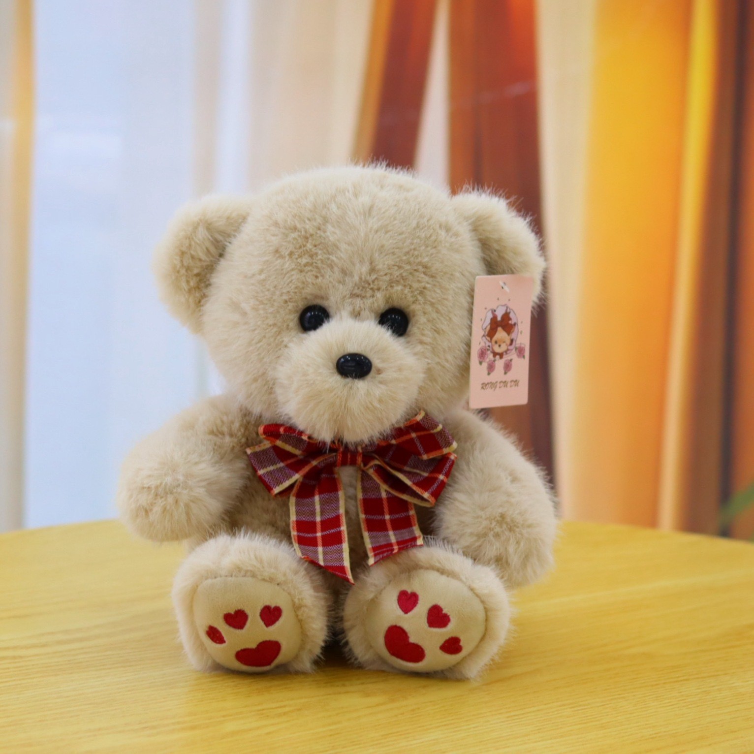 Orso con zampa rossa e blu - Papillon rosso