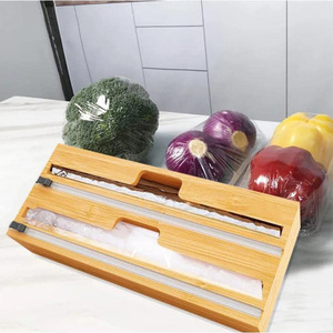 Cortador de film de bambú con caja de almacenamiento de madera para uso en la cocina, con soporte para papel de aluminio. - Product Image 1