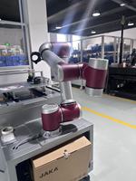 Station de travail automatique de chargement et de déchargement pour machine CNC, avec cobot d'alimentation et robot pour centre d'usinage