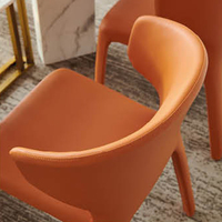 Vente directe d’usine design moderne et simple chaise à manger en cuir véritable de haute qualité éponge en forme spéciale chais