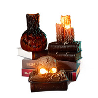 BUKE Bougeoir en plastique en forme de livre, lumineux, avec motifs de crâne et de citrouille d'Halloween, pièce décorative pour maisons hantées et salles d'évasion
