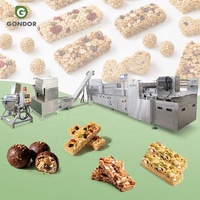 Machine de production de barres protéinées, de céréales au chocolat, de granola, de dattes, de sésame et d'arachides, avec extrudeuse et coupeuse de noix