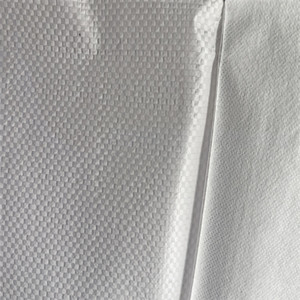 Tela tejida laminada con película de PE y tela no tejida de PP utilizada como barrera de vapor - Product Image 6