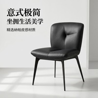 Chaise de salle à manger à assise fendue en tissu noir avec pieds plats en acier, en vente pour les acheteurs de cantines d'hôtels, cafés et tavernes