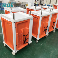 Chariot d'urgence médical MGE Health à 5 tiroirs, verrouillage centralisé, support IV, planche RCP, capacité de charge 150 kg, garantie à vie pour ER/USI