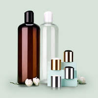 Maßgefertigte 500ml Bernsteinfarbene Schwarze Weiße Shampoo Conditioner Hautpflege Serum Lotion PET Plastikflasche mit Gold/Silber Disc-Flip-Verschluss