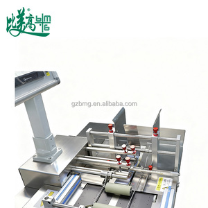 Marcatore laser automatico per la data di produzione di sacchetti di carta e selezionatore di qualità con impilamento automatico, conteggio e rifiuto delle unità difettose - Product Image 2