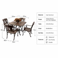 Ensemble de salle à manger d'extérieur en aluminium moulé bronze antique durable avec table à arche gothique et quatre fauteuils ornés pour jardin, parc et villa