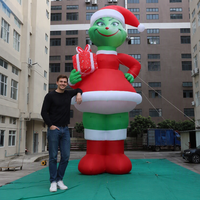Ballon gonflable géant Zhenmei de 50 pieds, monstre vert Grinch, avec ventilateur intégré et installation facile, tenant une boîte cadeau