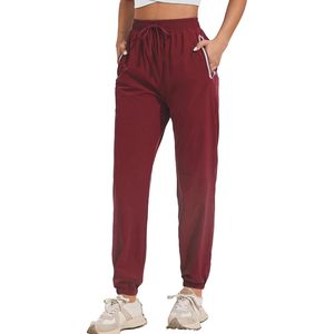 Pantalones de senderismo para mujer con bolsillos con cremallera, pantalones de punto informales resistentes al agua para actividades al aire libre - Product Image 1