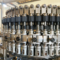 Machine de soufflage-remplissage-bouchage de blocs combinés PET à commande servo synchrone pour bouteilles en plastique de boissons et d'eau