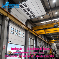 Porte sectionnelle industrielle à structure robuste, haute durabilité, fonctionnement fiable pour atelier industriel lourd, porte extérieure