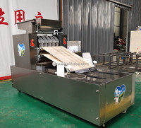 Machine à mouler rotative pour biscuits, forme personnalisée, machine à mouler rotative à rouleaux, plateau rotatif, machine à mouler des biscuits, machine à fabriquer des biscuits à vendre