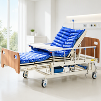Lit médical à courbes intégrales avec manivelle manuelle, contrôle de descente progressionnelle, cadre en bois pour le positionnement des patients, usage quotidien en salle de soins