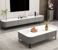 Ensemble table basse et meuble TV en bois massif avec plateau en marbre, design moderne et minimaliste, sur pieds, rangement au sol pour petit appartement
