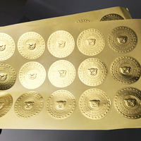 Autocollant de logo en métal personnalisé métallisé or étiquette adhésive de parfum en relief en feuille d'or pour bouteille de vin