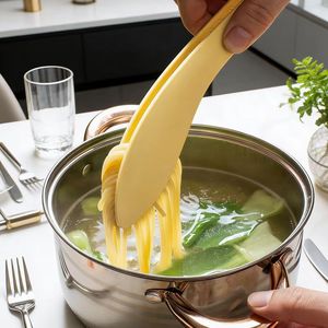 Pinzas de cocina de silicona con forma de hoja, resistentes al calor, de una pieza, con puntas invertidas para cocinar y servir - Product Image 1