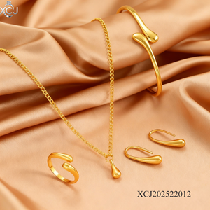 Ювелирный набор из четырех предметов: колье-капля, модный браслет, кольцо, серьги. Универсальный ювелирный комплект оптом. - Product Image 1