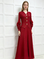 Robe longue plissée élégante et décontractée en mousseline tissée rose unie, coupe trapèze, taille naturelle, manches à volants, détail boutonné, pour soirée et printemps