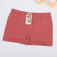 Shorts sans couture en polyamide et élasthanne de haute qualité pour femmes, marque Uokin, fabriqués à l'usine de Yiwu, confortables, taille basse, tricotés, style boyshorts, avec étiquette.