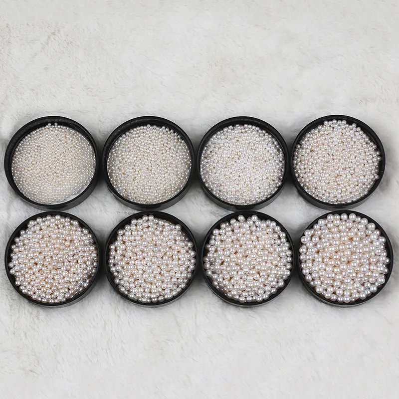 1,5-2mm kultivierte natürliche weiße echte Süßwasser lose winzige fast runde Perlen