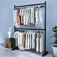 Nordique moderne métal Double barre pliant vêtements tige de suspension audacieux Double couche sol levage sec support Simple nordique salon